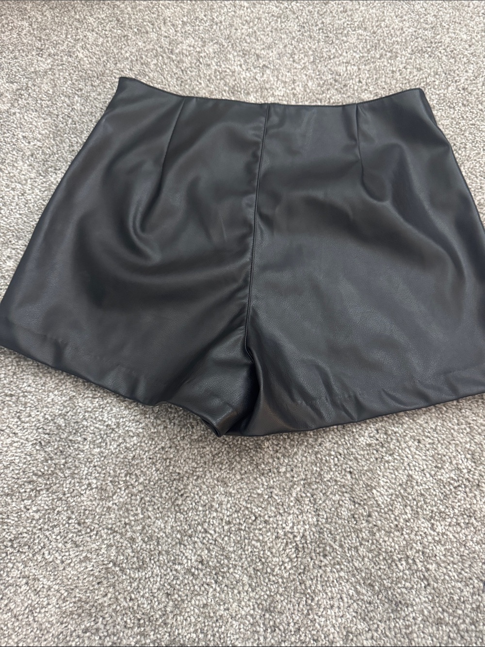 High-Waist Black Faux Leather Shorts. Zipper side.